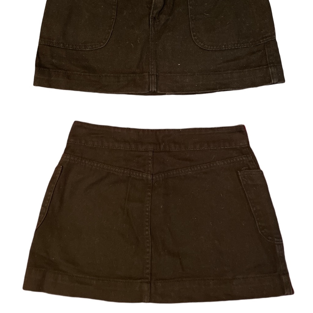 Black jean material skirt.